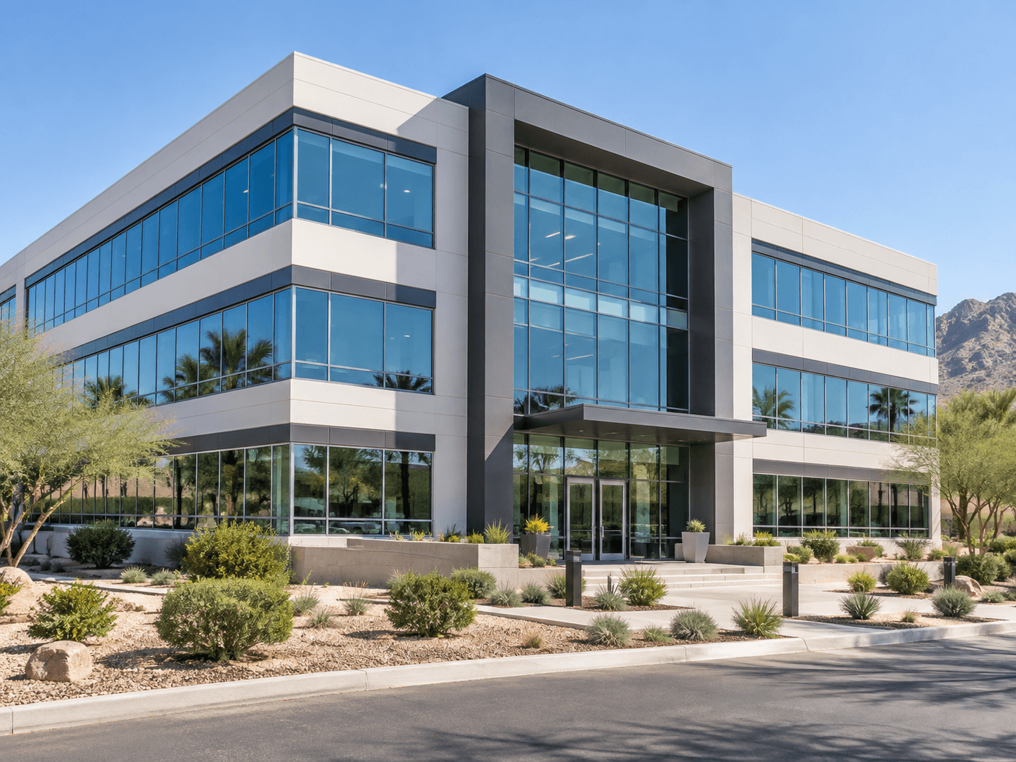 Modern Phoenix office building with large glass windows.