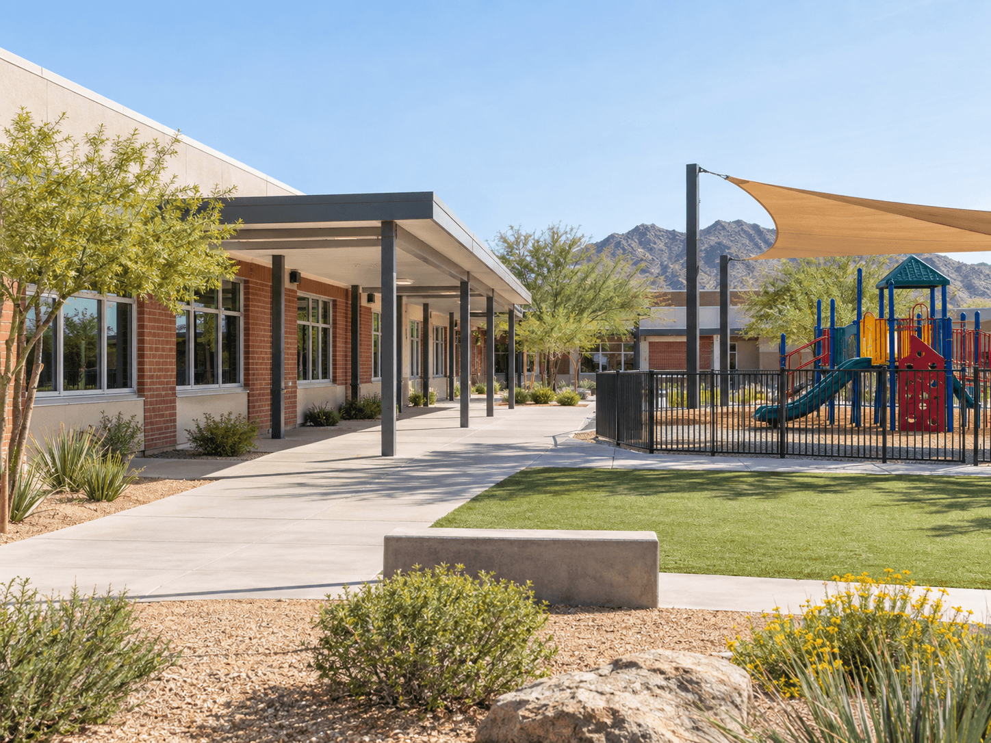 Scottsdale-area school with classroom windows and an outdoor playground.